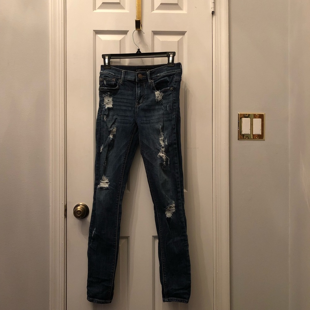 EXPRESS DISTRESSED MID RISE LEGGING SKINNY JEANS